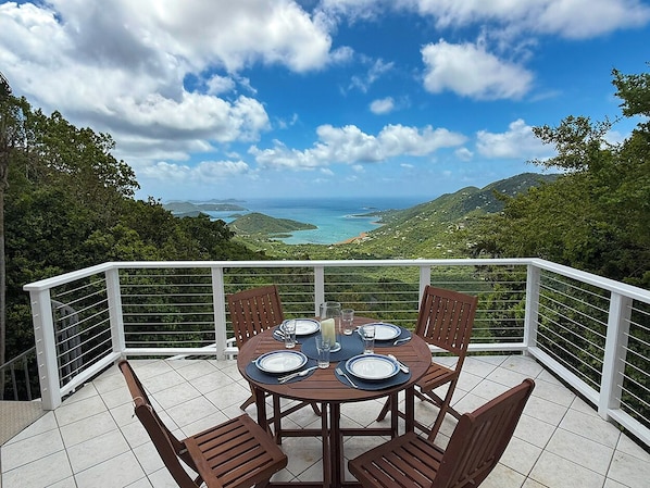 You will enjoying dining on the front deck at Aria, gazing out to the amazing views overlooking Coral Bay