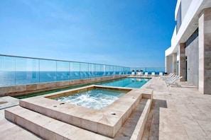 Building Pool & Hot Tub with Ocean and City view