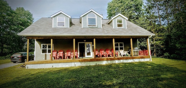 Vacation Home with a covered porch.
