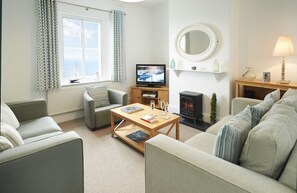 Ground floor: Sitting room with sea views