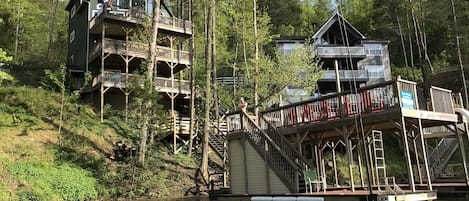 View of house and dock from cove. 