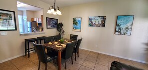 Dining table for 6. Bar stools for 2.