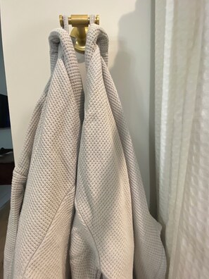 Luxurious robes await you in the primary bathroom!
