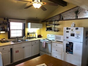 Kitchen; microwave, stove, refrigerator