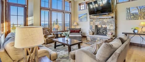 Living Area - Your group can take in the mountain views or a show in this cozy living room - Baldy Mountain Overlook Breckenridge Vacation Rental