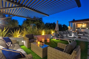 Night shot of the pool area.