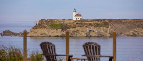 Relax on the bluff while watching the surf, beach and Cape Arago lighthouse.