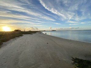 Wait! Where is the beach again? Your backyard! It comes with stunning sunsets...
