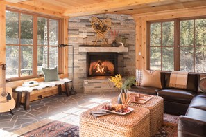 Natural light fills the cozy interior. *please note that two out of our four fireplaces are non-operational*