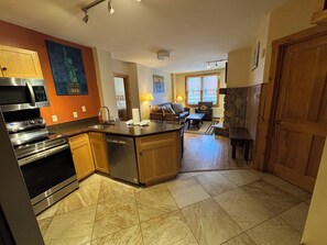 Kitchen and Living Room.