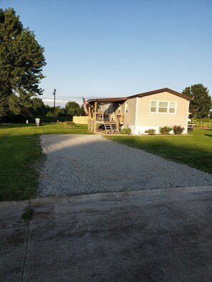 Keypad entry. Easy access to the covered deck. With plenty of parking space. 