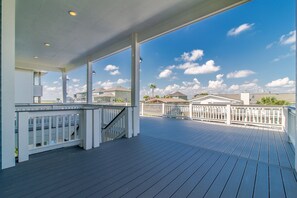 Expansive first floor deck overlooking canal