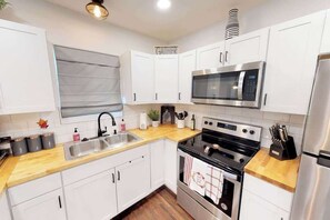 Bright kitchen with new appliances