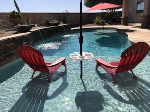 Pool with 2 Baja Shelves and two in water umbrellas