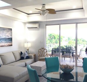 Living area balcony with table seating for 6 people