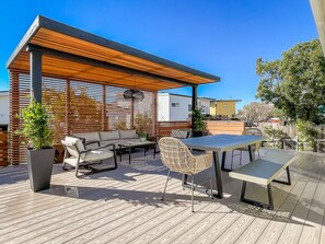 Outdoor dining table and lounge seating