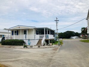 View of the wide open space on this roomy corner lot