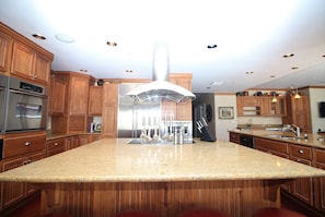 DRAMATIC KITCHEN WITH DOUBLE ISLANDS
