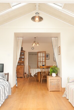 Sitting room through to dining/kitchen area