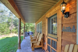 Porch with Adirondack chairs