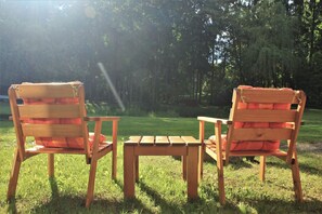 Enjoy warm sunlight under the old lime trees