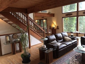 Living room, stairway to master bedroom.