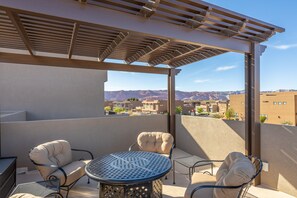 Outdoor Firepit & Chairs on Deck - Located on the rooftop. Enjoy sitting in comfort under the stairs while you stay warm next to the firpit.