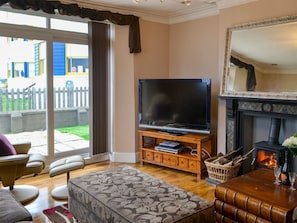 Welcoming living room with wood burner | The View Old Coastguard Cottage, Tynemouth