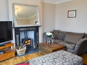 Welcoming living room with wood burner | The View Old Coastguard Cottage, Tynemouth