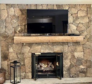 Cozy Gas Fireplace with smart TV  to stream all your favorite shows