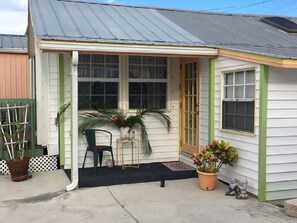Little covered porch outside of the attached in-law unit.