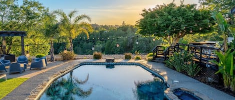 Begin your day with a refreshing swim as the sunrise paints the rolling hills