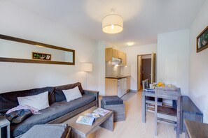 Sink into the cozy sofa after a day exploring the area.