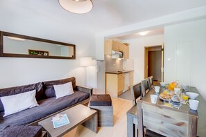 Sink into the cozy sofa after a day exploring the area.