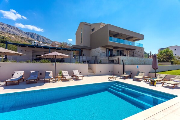 Villa Diva with 7 bedrooms, a heated pool, sauna and fun zone, sea views