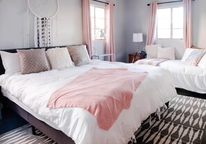 King bedroom sleeps up to 3. Plenty of storage in dressers or double closets. 
