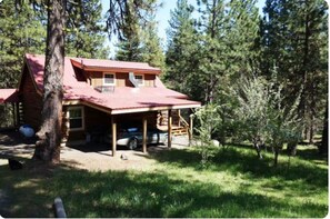 carport and small fruit orchard