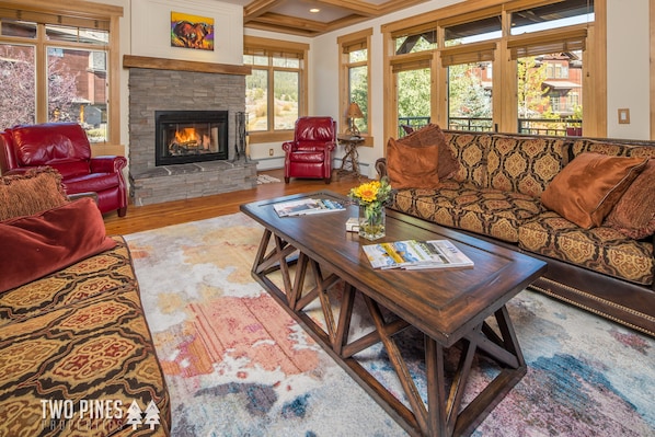 Living Room with Wood Burning Fireplace & Flat Screen TV