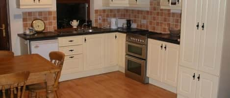 kitchen in cottage at MOUNTSHANNON in EAST CLARE