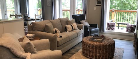 View upon entering the front door.  Open living, dining, and kitchen area.  