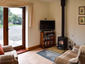 Lounge area with wood burner | Brooklands Cottage, Bellerby, near Leyburn