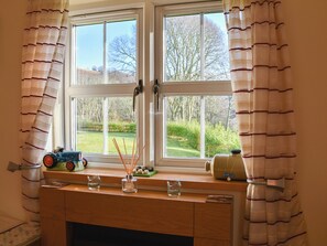 Delightful rural views from the living room window | River Cottage - Milton, Drumnadrochit, near Inverness