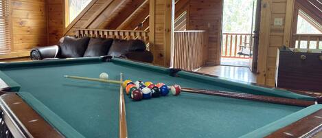 Just inside on the third level, shoot a game of pool in this awesome game loft!