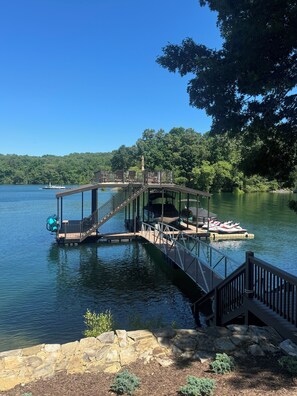 Double deck dock with two kayaks and SUP