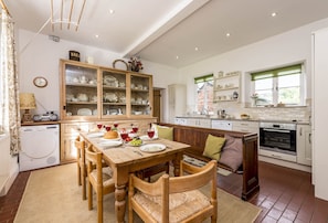 Ground floor: Farmhouse kitchen with breakfast table seating six guests