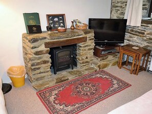 Relax in the cosy living area | Mill Cottage, Fowey