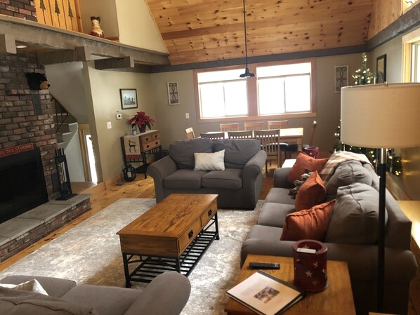 Living Room with new carpet and throw pillows. 