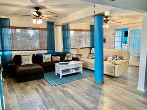 View of Living area and doors to bedroom 4