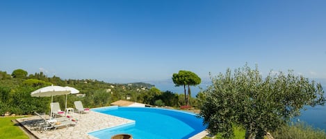 Private swimming pool and views towards Corfu Town and the Greek mainland.