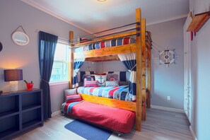 Custom full-full bunks & twin, Roku TV, VCR  & DVDs (phn chargers, fans & light)